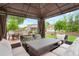 Outdoor gazebo featuring comfortable seating, perfect for relaxing and entertaining in the backyard at 16650 E 107Th Ct, Commerce City, CO 80022