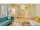 Inviting living room features hardwood floors and bright natural light at 16650 E 107Th Ct, Commerce City, CO 80022