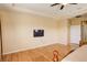 Bright main bedroom featuring hardwood floors, a ceiling fan and recessed lighting at 16650 E 107Th Ct, Commerce City, CO 80022
