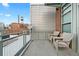 Relax on this balcony with seating and industrial views at 1890 Wynkoop St # 806, Denver, CO 80202