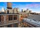 Enjoy the evening skyline view from this building's charming balcony at 1890 Wynkoop St # 806, Denver, CO 80202