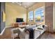 Cozy living room with large windows, stylish furniture, and exposed ductwork at 1890 Wynkoop St # 806, Denver, CO 80202