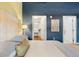 Comfortable main bedroom featuring a walk-in closet and adjacent bathroom at 1890 Wynkoop St # 806, Denver, CO 80202