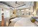 Comfortable main bedroom featuring exposed ductwork and a cushioned headboard at 1890 Wynkoop St # 806, Denver, CO 80202