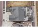 Aerial view of the roof, driveway, and stone patio with outdoor kitchen at 20503 E 50Th Pl, Denver, CO 80249