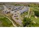 Aerial view showcases homes bordering a golf course in a well-planned residential community at 20503 E 50Th Pl, Denver, CO 80249