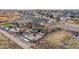 Aerial view of backyard with a patio, outdoor kitchen, pergola and manicured landscaping at 20503 E 50Th Pl, Denver, CO 80249