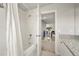 Hall bathroom with tub and shower combination near the hallway at 20503 E 50Th Pl, Denver, CO 80249