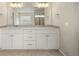 Bathroom with double vanity, modern lighting, and ample storage space at 20503 E 50Th Pl, Denver, CO 80249
