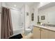Bathroom featuring a shower-tub combination, granite countertop and neutral walls and flooring at 20503 E 50Th Pl, Denver, CO 80249