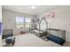 bedroom with playful decor, natural light, and ample space for play at 20503 E 50Th Pl, Denver, CO 80249
