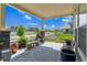 Charming front porch with a seating area offers relaxing views of the neighborhood at 20503 E 50Th Pl, Denver, CO 80249