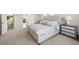 Spacious main bedroom with a comfortable bed, stylish decor, and plush carpet at 20503 E 50Th Pl, Denver, CO 80249
