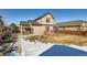 House with backyard, deck, hot tub, and shed at 164 Bristlecone St, Brighton, CO 80601