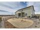 Spacious backyard with straw and gravel covering the yard at 12762 Bend Ct, Firestone, CO 80504