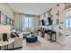 Cozy living room featuring a comfortable couch and modern decor at 12762 Bend Ct, Firestone, CO 80504