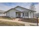 Charming single-story home with a well-manicured front yard and inviting entrance at 19 Carla Way, Broomfield, CO 80020