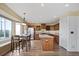 Spacious eat-in kitchen with ample counter space, stainless steel appliances and a cozy dining area at 708 S Carlton St, Castle Rock, CO 80104