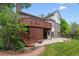 View of backyard featuring a patio and deck areas perfect for entertaining at 9117 Buck Hill Dr, Highlands Ranch, CO 80126