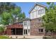 View of the backyard featuring a patio and large deck for relaxing at 9117 Buck Hill Dr, Highlands Ranch, CO 80126