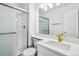 Bathroom featuring a glass shower, a single sink, and a white vanity at 9117 Buck Hill Dr, Highlands Ranch, CO 80126