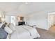 Spacious primary bedroom featuring neutral walls, carpet flooring, and a walk-in closet at 9117 Buck Hill Dr, Highlands Ranch, CO 80126