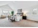 Bright, spacious bedroom with a vaulted ceiling, bay window seating area, and plush carpeting at 9117 Buck Hill Dr, Highlands Ranch, CO 80126