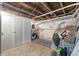 Unfinished basement with exposed ceilings and utilities at 3005 California St, Denver, CO 80205