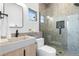 Modern bathroom features concrete sink, glass shower, and sleek black fixtures, creating a spa-like retreat at 2206 Alpine Dr, Boulder, CO 80304