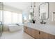 Luxurious bathroom with double vanity and soaking tub at 2206 Alpine Dr, Boulder, CO 80304
