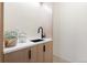 Modern sink and cabinet with beautiful jars for storage on a large countertop at 2206 Alpine Dr, Boulder, CO 80304