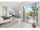 Bright bedroom with large windows and access to a balcony at 2206 Alpine Dr, Boulder, CO 80304