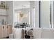 Open dining room with chandelier and view into living area at 2206 Alpine Dr, Boulder, CO 80304