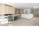 Open living space featuring a built-in fireplace and large windows at 2206 Alpine Dr, Boulder, CO 80304