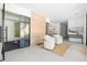 Spacious living area featuring bright, airy space, a modern design, and access to a home gym through glass doors at 2206 Alpine Dr, Boulder, CO 80304