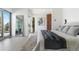 Large main bedroom with floor to ceiling windows and a luxurious feel at 2206 Alpine Dr, Boulder, CO 80304