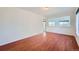 Bedroom with hardwood floors, neutral paint, and lots of natural light at 5131 Netherland St, Denver, CO 80249