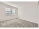 Clean bedroom with a neutral color scheme and windows allowing natural light at 5131 Netherland St, Denver, CO 80249