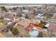 Aerial view of house and backyard with deck at 4611 S Queen St, Littleton, CO 80127