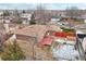 Aerial view of a ranch style home with a large backyard and deck at 4611 S Queen St, Littleton, CO 80127