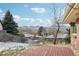 Backyard with deck and mountain views at 4611 S Queen St, Littleton, CO 80127