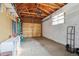 Spacious garage with pegboard and ample storage at 4611 S Queen St, Littleton, CO 80127