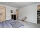 Bedroom showcasing neutral walls, plush carpeting, and ample closet space at 9643 Birch Ln, Thornton, CO 80229
