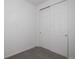 A spacious closet with plenty of storage and white sliding doors at 9643 Birch Ln, Thornton, CO 80229