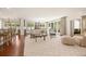 Bright living room with hardwood floors, sliding glass doors, and stylish furniture at 344 Saint Paul St, Denver, CO 80206