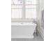 Serene bathroom with a soaking tub and elegant fixtures at 1018 Fillmore St, Denver, CO 80206