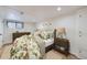 Finished basement bedroom with wood floors at 7023 S Buffalo St, Littleton, CO 80120