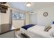 Charming bedroom with wood floors and window at 7023 S Buffalo St, Littleton, CO 80120