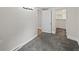 Bedroom featuring neutral colors, carpet, and access to a closet and the adjacent rooms at 4232 S Grant St, Englewood, CO 80113