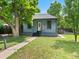 Charming single-story home features a well-maintained lawn and an inviting entrance at 4232 S Grant St, Englewood, CO 80113